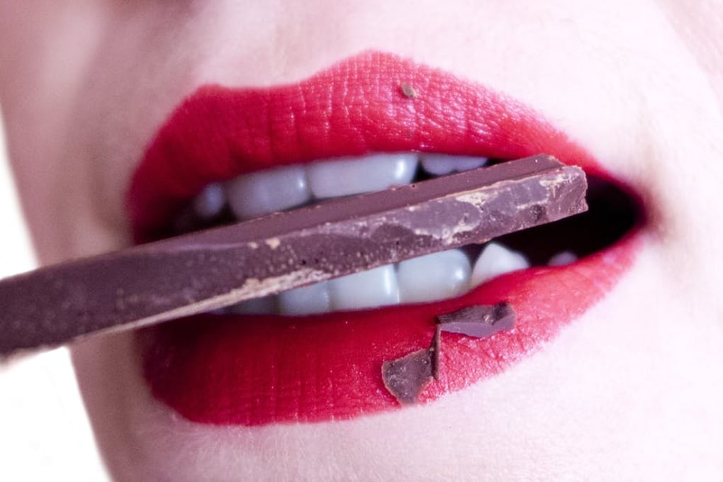 This Australian Photographer Is Fascinated By Cooking With Your Mouth 1 woman mouth teeth sweets 37831