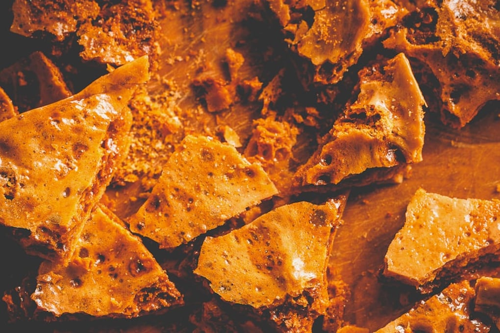 What Is Toffee? What to Know About This Sweet Treat 1 photo 1633964913707 0bed7de47021?crop=faces%2Cedges&cs=tinysrgb&fit=crop&fm=jpg&ixid=MnwxMjA3fDB8MXxhbGx8fHx8fHx8fHwxNjY2NjI3MDY1&ixlib=rb 4.0.3&q=60&w=1200&auto=format&h=630&mark w=64&mark align=top%2Cleft&mark pad=50&blend mode=normal&blend alpha=10&blend w=1&mark=https%3A%2F%2Fimages.unsplash.com%2Fopengraph%2Flogo
