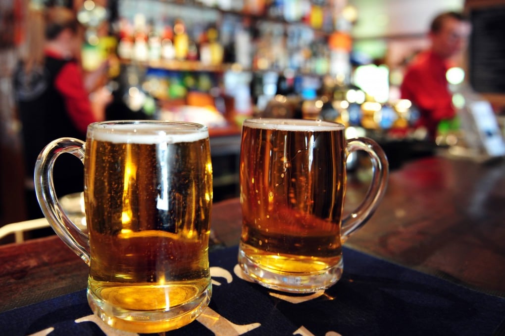 Two cups of beer in bar