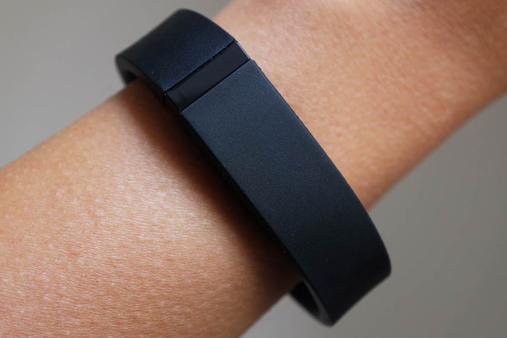 fitbit flex activity tracker black on wrist