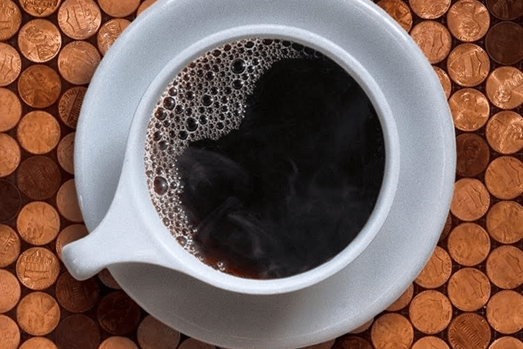 black coffee pennies spoon