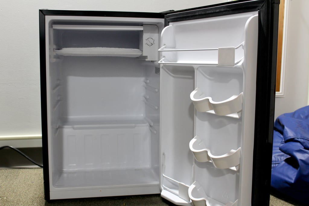 The freezer compartment of my new mini fridge is completely open in the  back. Does this actually freeze, or is it sham? : r/Appliances