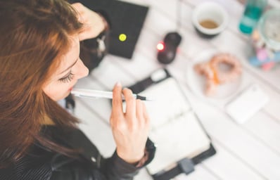 10 Unhealthy Habits You Developed First Semester That Need to Stop Second Semester 2 woman hand desk office