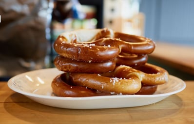 Willkommen to Squabisch Pretzels: Berkeley's Twist on German Pretzels 2 photo 1607103058027 4c5b42b86a60?crop=faces%2Cedges&cs=tinysrgb&fit=crop&fm=jpg&ixid=MnwxMjA3fDB8MXxhbGx8fHx8fHx8fHwxNjUxNzgyMzEy&ixlib=rb 1.2.1&q=60&w=1200&auto=format&h=630&mark w=64&mark align=top%2Cleft&mark pad=50&blend mode=normal&blend alpha=10&blend w=1&mark=https%3A%2F%2Fimages.unsplash.com%2Fopengraph%2Flogo