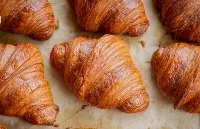 Chocolate Croissants and Chai Lattes: Café Coralie Returns to Campus 2 photo 1623334044303 241021148842?ixlib=rb 1.2.1&q=60&fm=jpg&crop=faces%2Cedges&cs=tinysrgb&w=1200&fit=crop&auto=format&h=630&mark w=64&mark align=top%2Cleft&mark pad=50&blend mode=normal&blend alpha=10&blend w=1&mark=https%3A%2F%2Fimages.unsplash.com%2Fopengraph%2Flogo