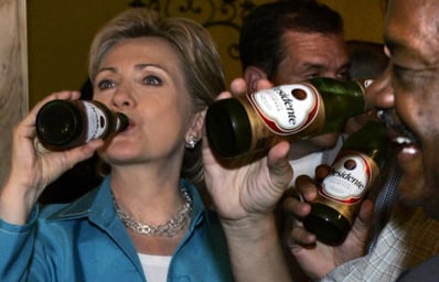 hillary drinking elcalce.com