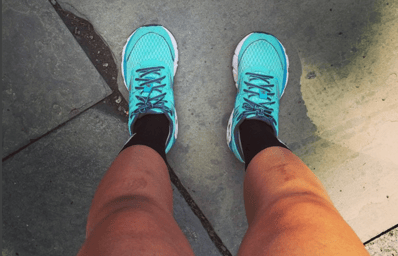 Running shoes sidewalk