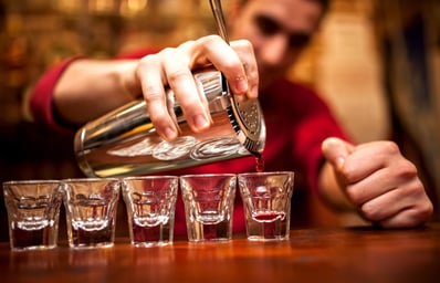 bartender pouring shots