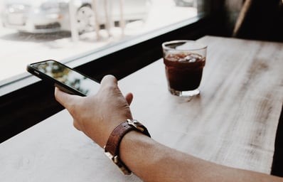 phone in hand coffee sightglasscoffee2 amycho