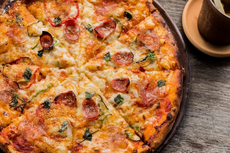 Home of the Pilsen Pie; Northwestern Students Flock to Bob’s Pizza 6 photo 1506354666786 959d6d497f1a?ixlib=rb 1.2.1&q=60&fm=jpg&crop=faces%2Cedges&cs=tinysrgb&w=1200&fit=crop&auto=format&h=630&mark w=64&mark align=top%2Cleft&mark pad=50&blend mode=normal&blend alpha=10&blend w=1&mark=https%3A%2F%2Fimages.unsplash.com%2Fopengraph%2Flogo