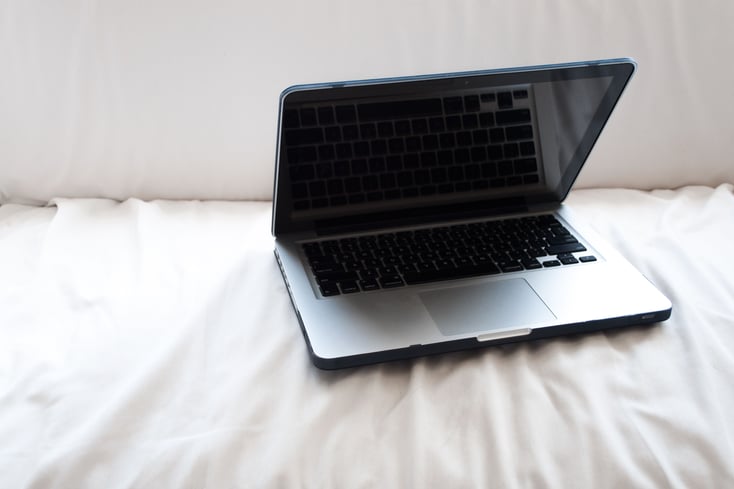 laptop on bed