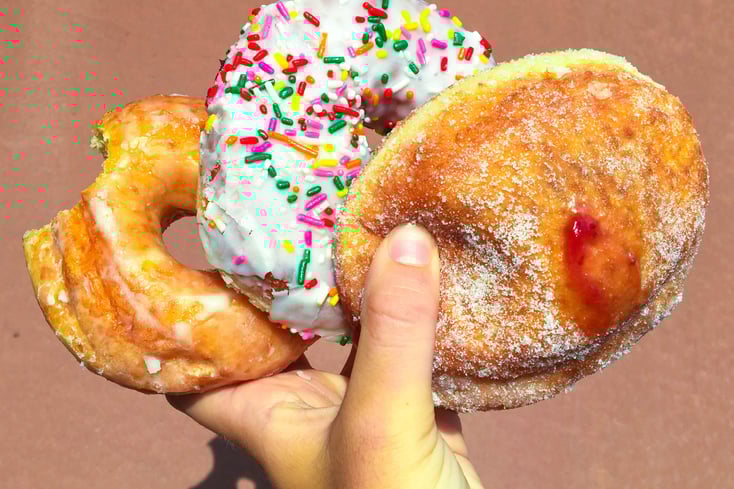 donuts in hand