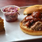 Pulled pork sandwich with cornbread and slaw Photo by Kristen Yang