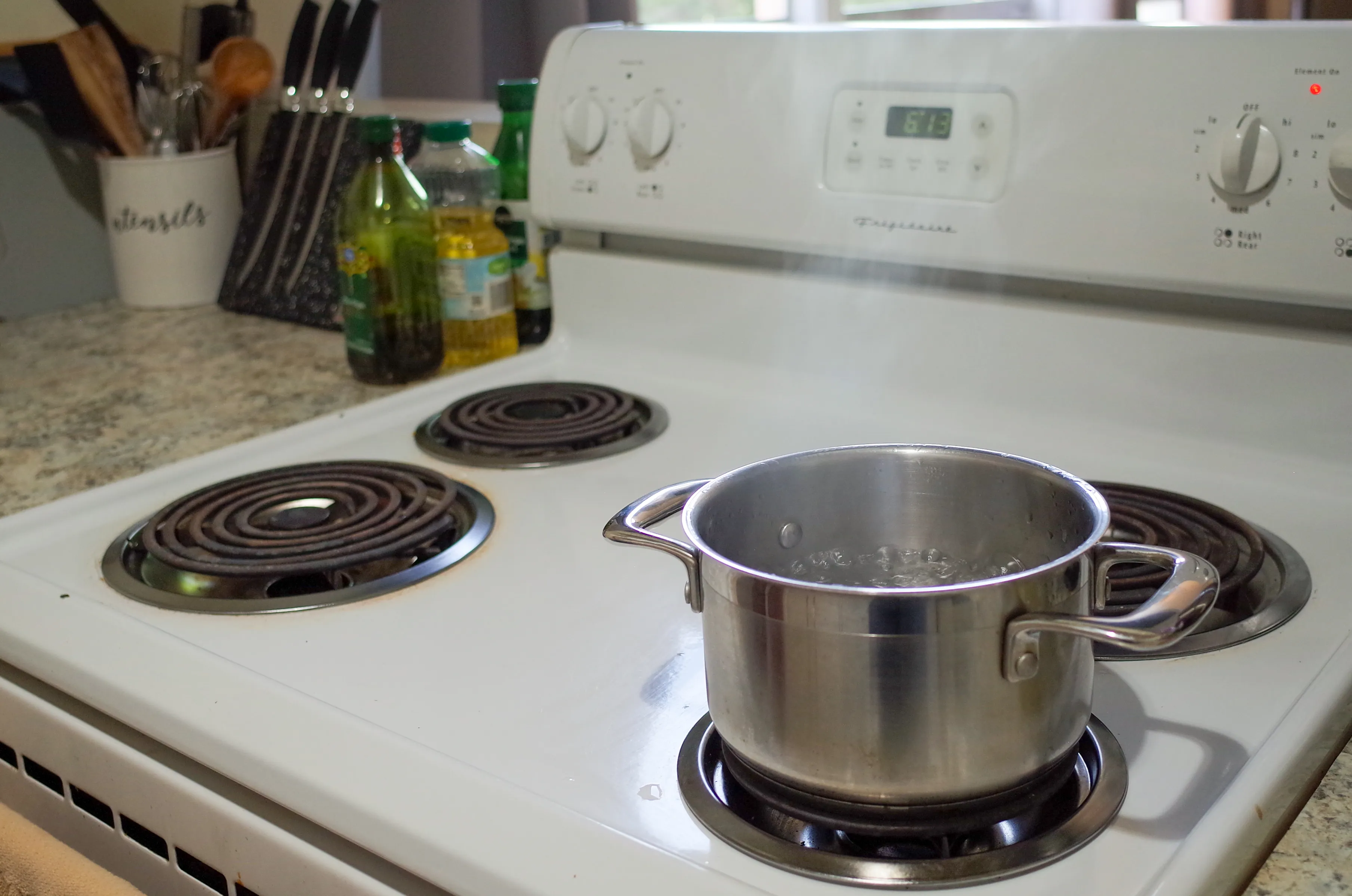 Boiling water on stove